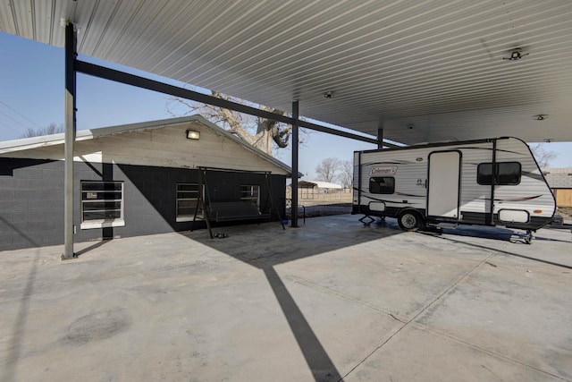 view of patio / terrace with a carport