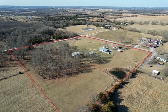 bird's eye view with a rural view