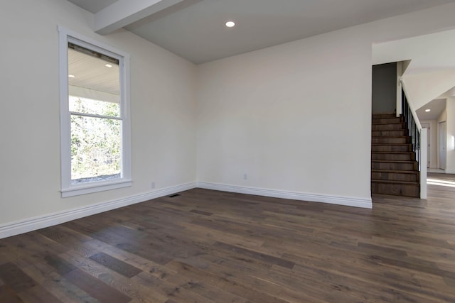 unfurnished room with stairs, recessed lighting, dark wood finished floors, and baseboards