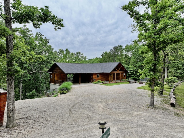 420 Nps Peavine, Van Buren, MO 63965 - log home featuring driveway, a porch, and a shingled roof