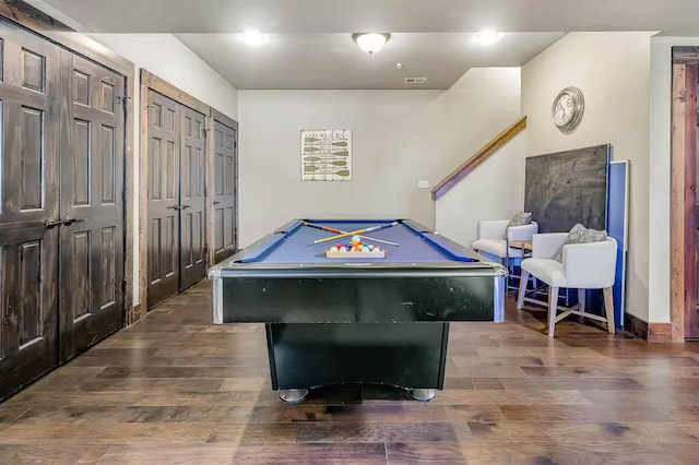 recreation room featuring pool table, wood finished floors, visible vents, and baseboards