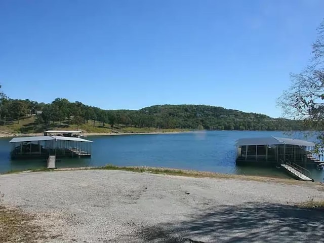 view of dock with a water view