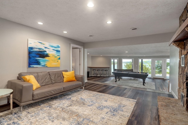 playroom with pool table, a textured ceiling, wood finished floors, and recessed lighting