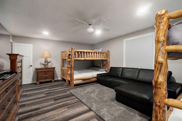 bedroom featuring dark wood-style floors, baseboards, a ceiling fan, and recessed lighting