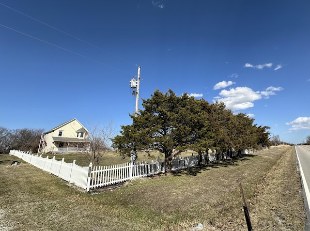 view of front facade with a fenced front yard