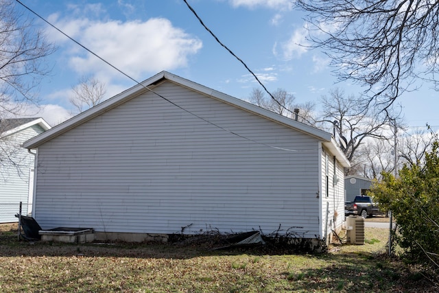 908 Jefferson Ave, Joplin, MO 64801 - view of side of property featuring fence and central AC unit