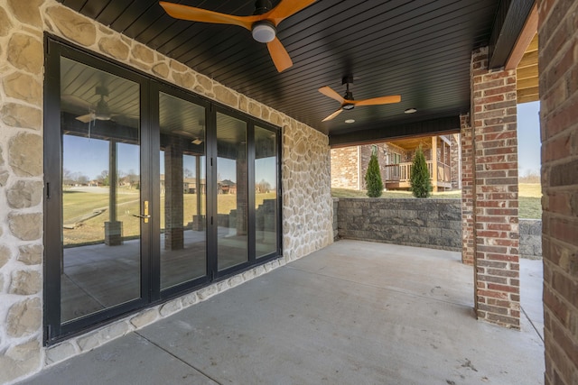 view of patio / terrace featuring ceiling fan