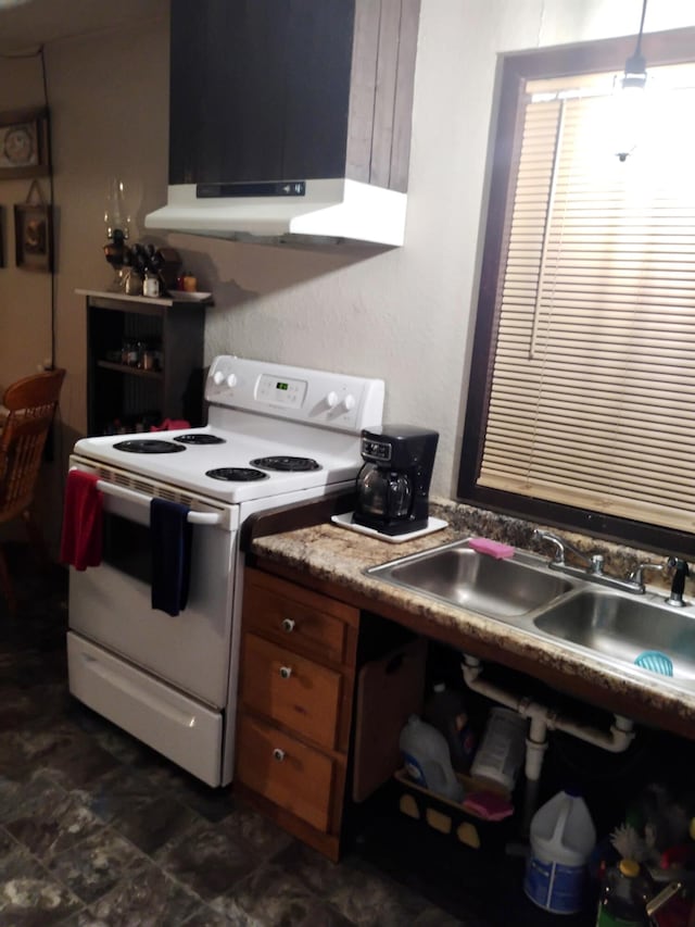 kitchen with brown cabinetry, a sink, exhaust hood, and white range with electric cooktop
