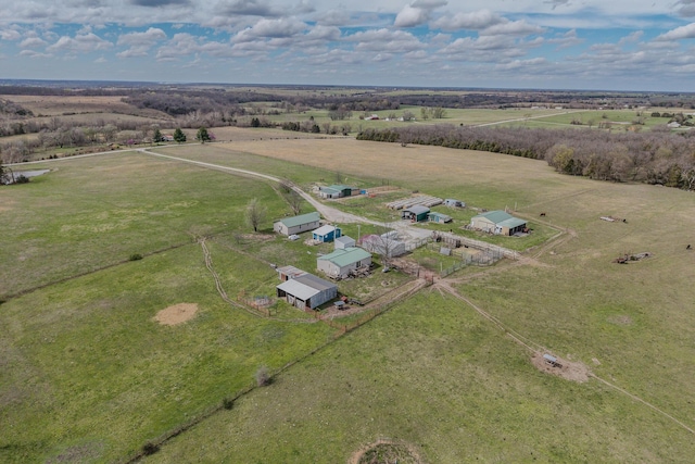 birds eye view of property featuring a rural view