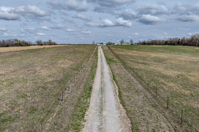 view of street featuring a rural view and driveway