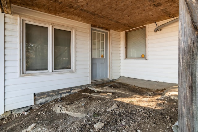 doorway to property with a porch