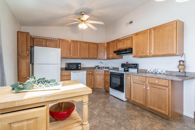 kitchen featuring white appliances, visible vents, a ceiling fan, range hood, and a sink