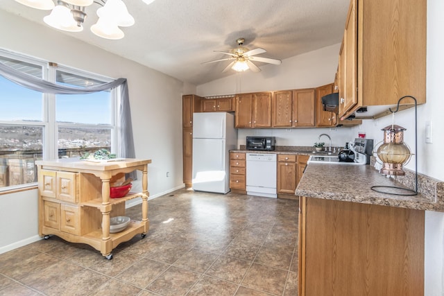 kitchen featuring range hood, open shelves, vaulted ceiling, white appliances, and ceiling fan with notable chandelier