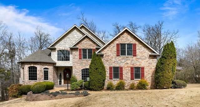 view of front of home featuring brick siding