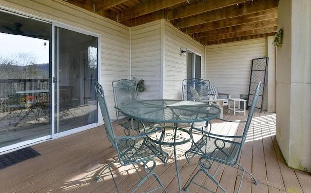 deck with outdoor dining space