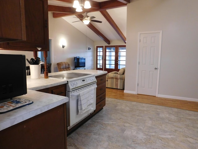 kitchen with vaulted ceiling with beams, a peninsula, open floor plan, light countertops, and white range with electric cooktop