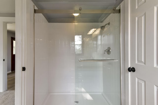 full bathroom featuring a stall shower