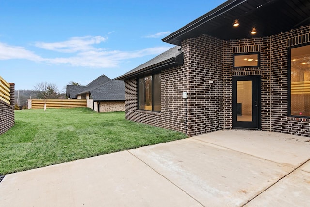 3941 E Woodhue St, Springfield, MO 65802 - entrance to property featuring a patio area and brick siding