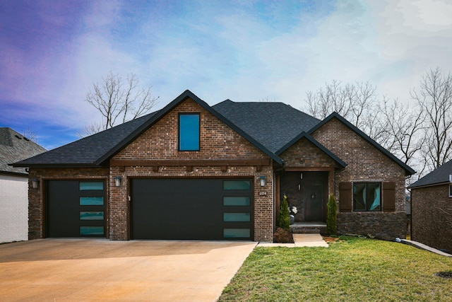 view of front of house featuring driveway, a garage, and brick siding