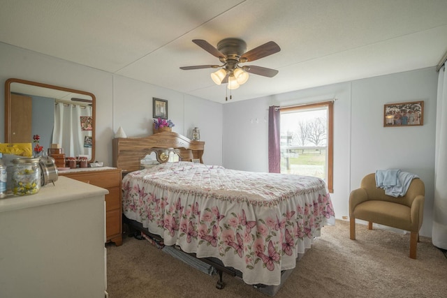 bedroom featuring light carpet and ceiling fan