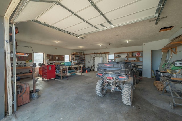 garage with a workshop area