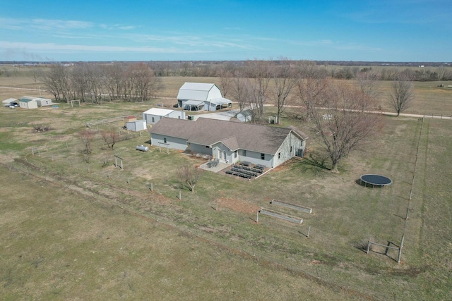 birds eye view of property with a rural view