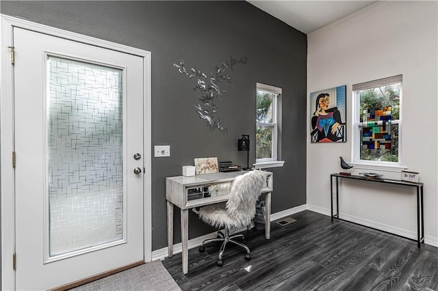 home office with visible vents, baseboards, and dark wood-style flooring