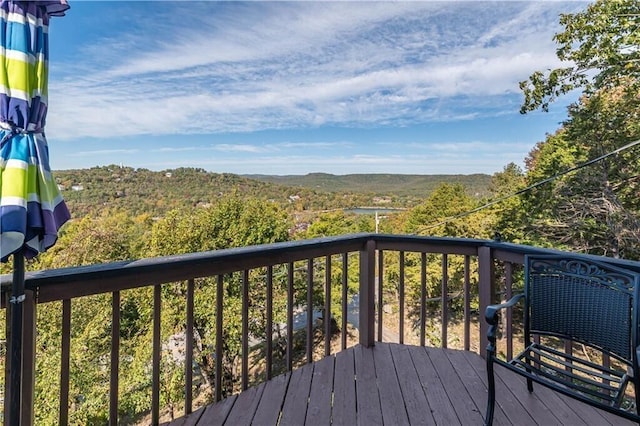 deck with a wooded view