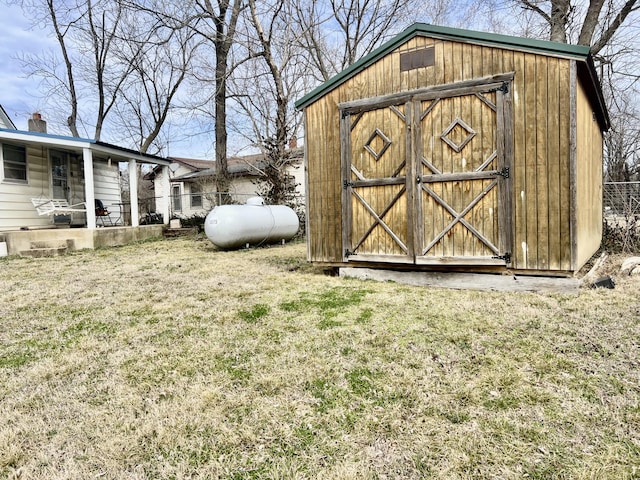 view of shed with fence