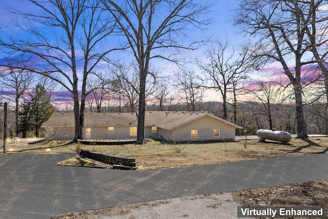 view of front of home featuring aphalt driveway