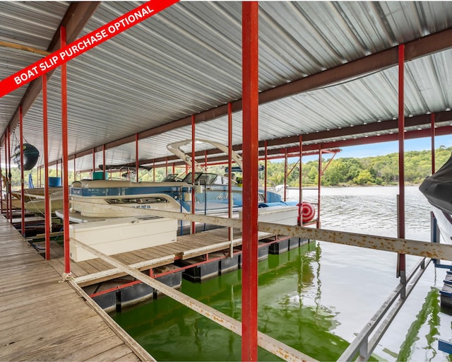 dock area featuring a water view and boat lift