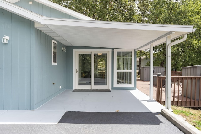 view of patio featuring fence and a wooden deck