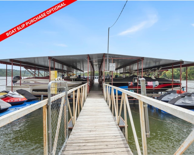 view of dock with a water view and boat lift