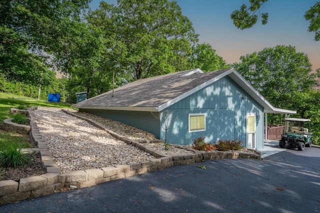 466 Buck Run Dr, Branson West, MO 65737 - view of side of home with roof with shingles and brick siding