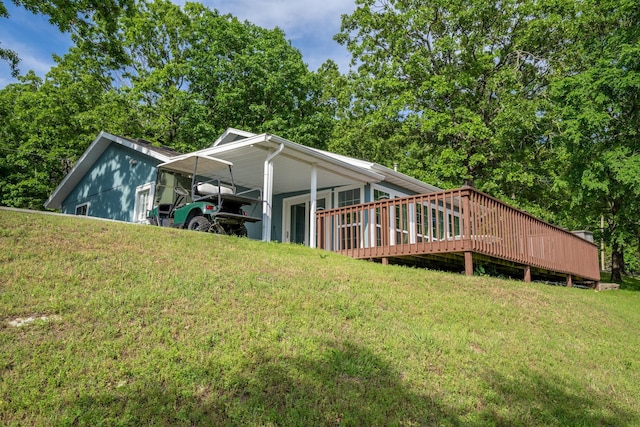 466 Buck Run Dr, Branson West, MO 65737 - view of property exterior featuring a lawn and a wooden deck