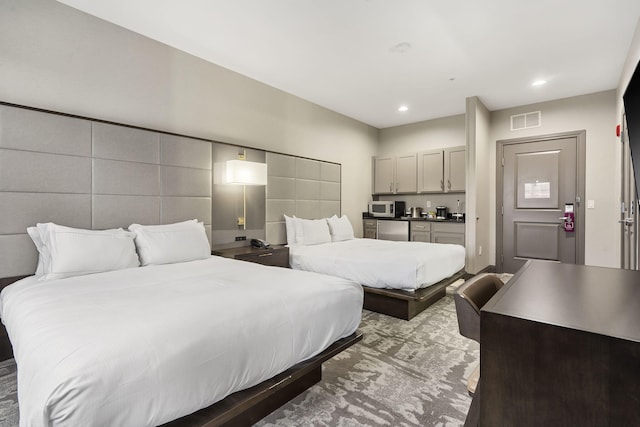 bedroom featuring recessed lighting and visible vents