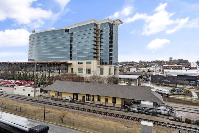 view of building exterior featuring fence