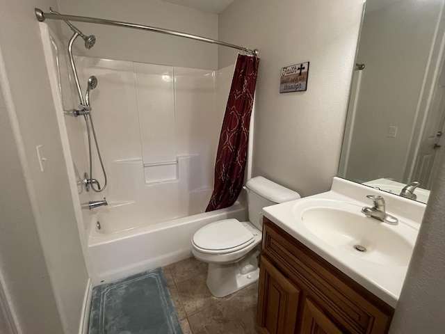 full bathroom featuring vanity, shower / bath combo with shower curtain, toilet, and tile patterned floors