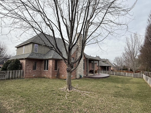 exterior space with a patio and a fenced backyard