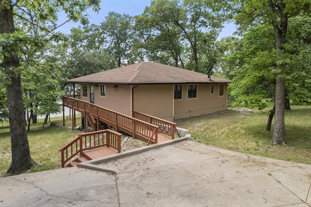 24311 Raintree Ln, Shell Knob, MO 65747 - back of house with a lawn, roof with shingles, a patio, a wooden deck, and stairs