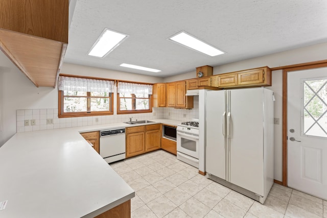 24311 Raintree Ln, Shell Knob, MO 65747 - kitchen featuring white appliances, tasteful backsplash, and light countertops