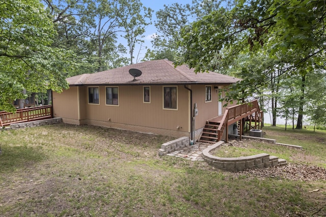 24311 Raintree Ln, Shell Knob, MO 65747 - rear view of house with stairs, a deck, a yard, and a shingled roof