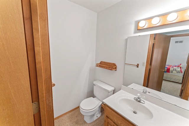 24311 Raintree Ln, Shell Knob, MO 65747 - half bathroom featuring toilet, vanity, and baseboards
