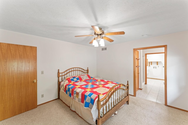 24311 Raintree Ln, Shell Knob, MO 65747 - bedroom featuring light colored carpet, baseboards, a textured ceiling, a ceiling fan, and light tile patterned floors