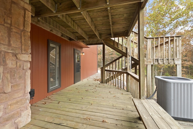 deck featuring stairway and central air condition unit