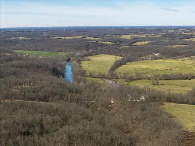 birds eye view of property with a rural view