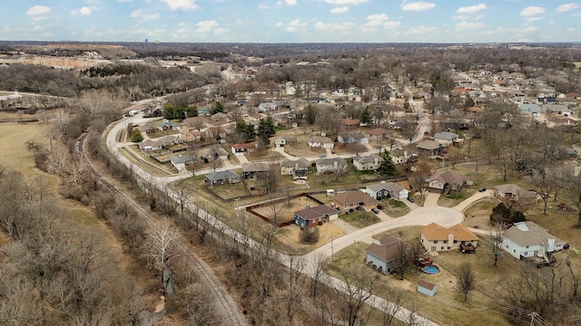 birds eye view of property with a residential view