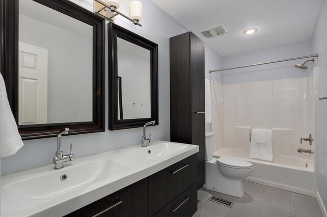 full bath featuring toilet, visible vents, and a sink