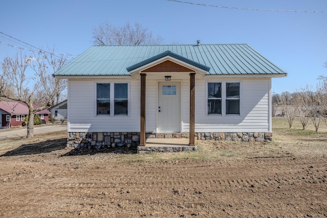 bungalow-style house featuring crawl space and metal roof