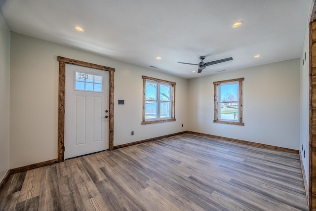 foyer entrance featuring recessed lighting, baseboards, and wood finished floors